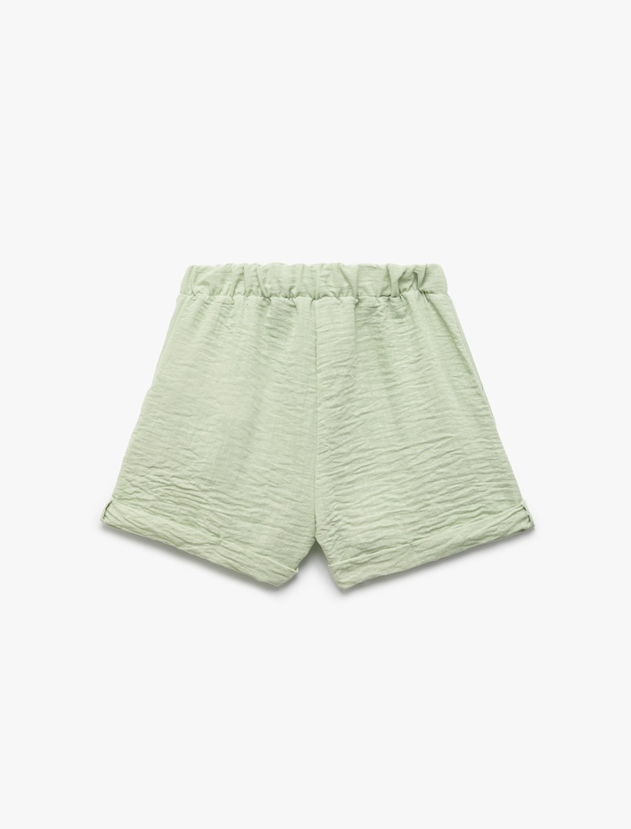 Kız Çocuk Katlamalı Paça Keten Görünümlü Bol Kalıp Fiyonklu Şort