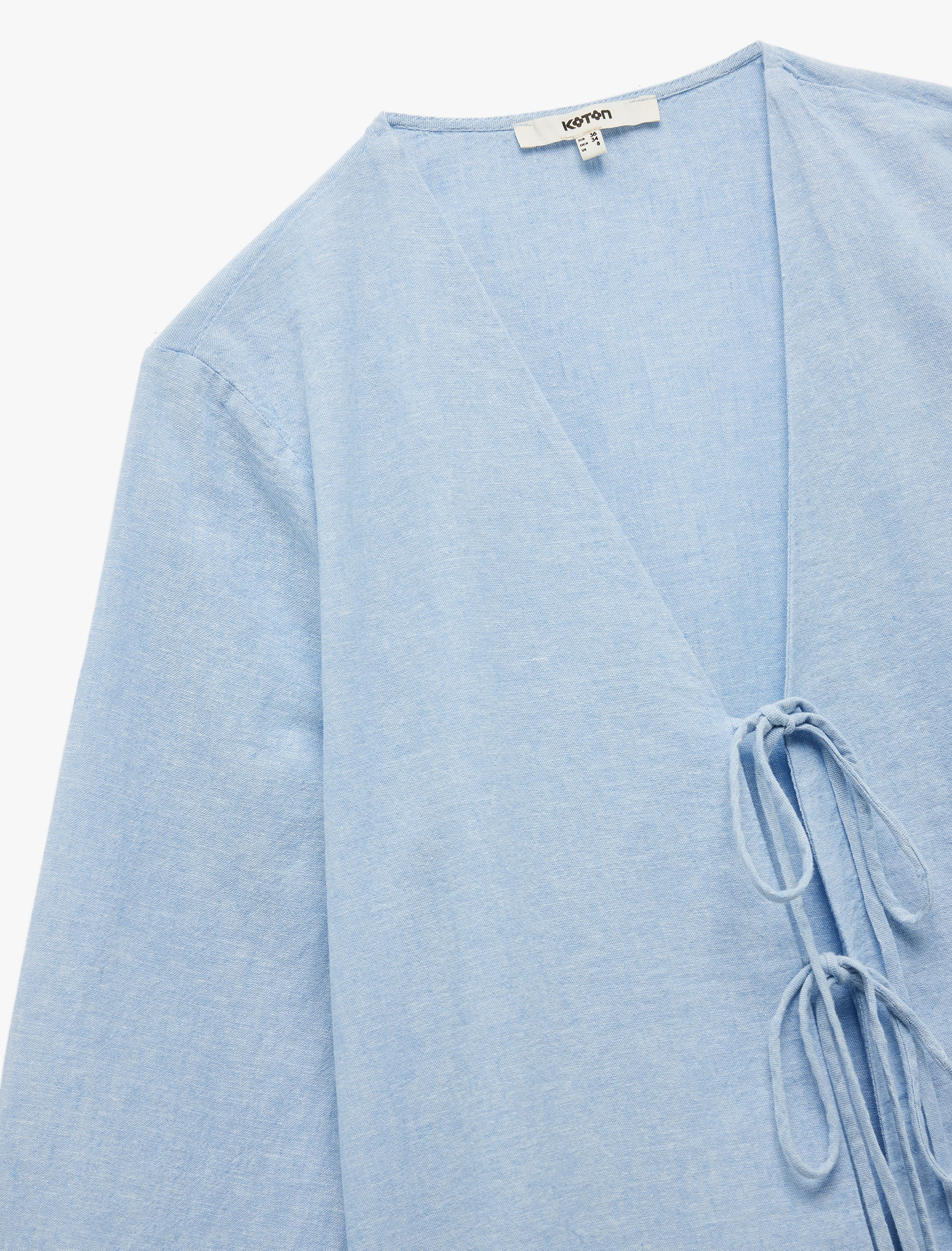   Bol Kalıp 3/4 Kol V Yaka Önden Bağlama Detaylı Keten Bluz