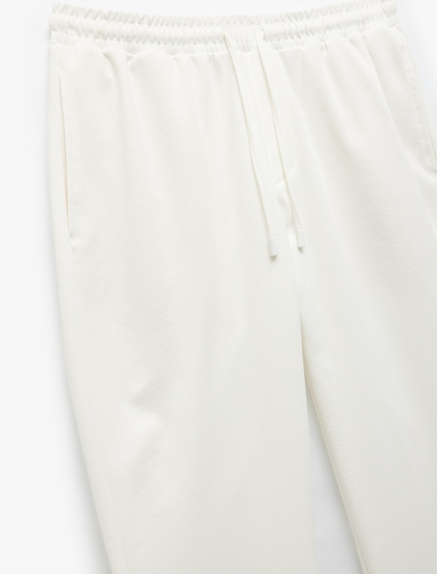 Katlamalı Paça Cep Detaylı Beli Bağcıklı Eşofman Pantolon_4