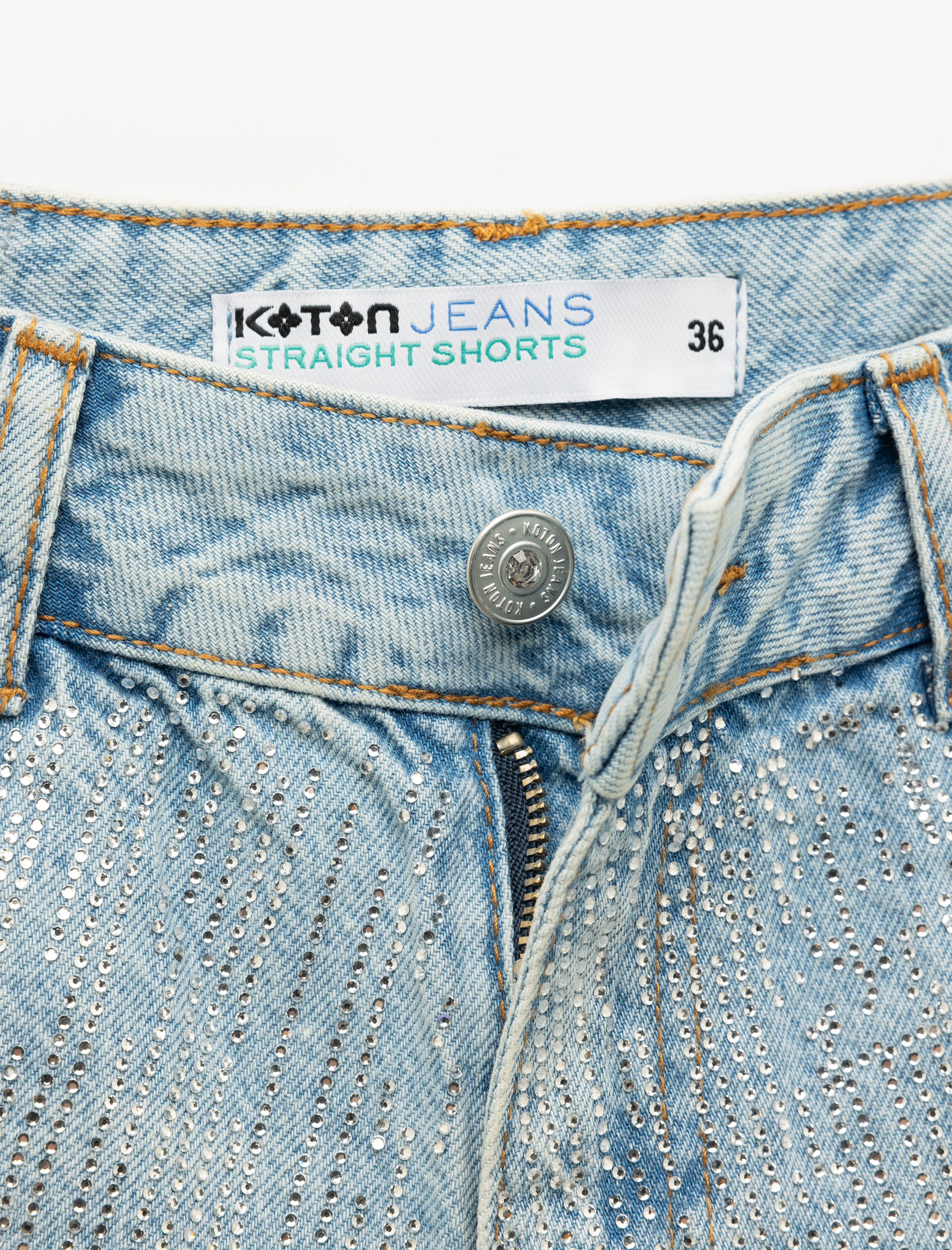   Yüksek Bel Rahat Kesim Pamuklu Yırtık Mini Denim Şort