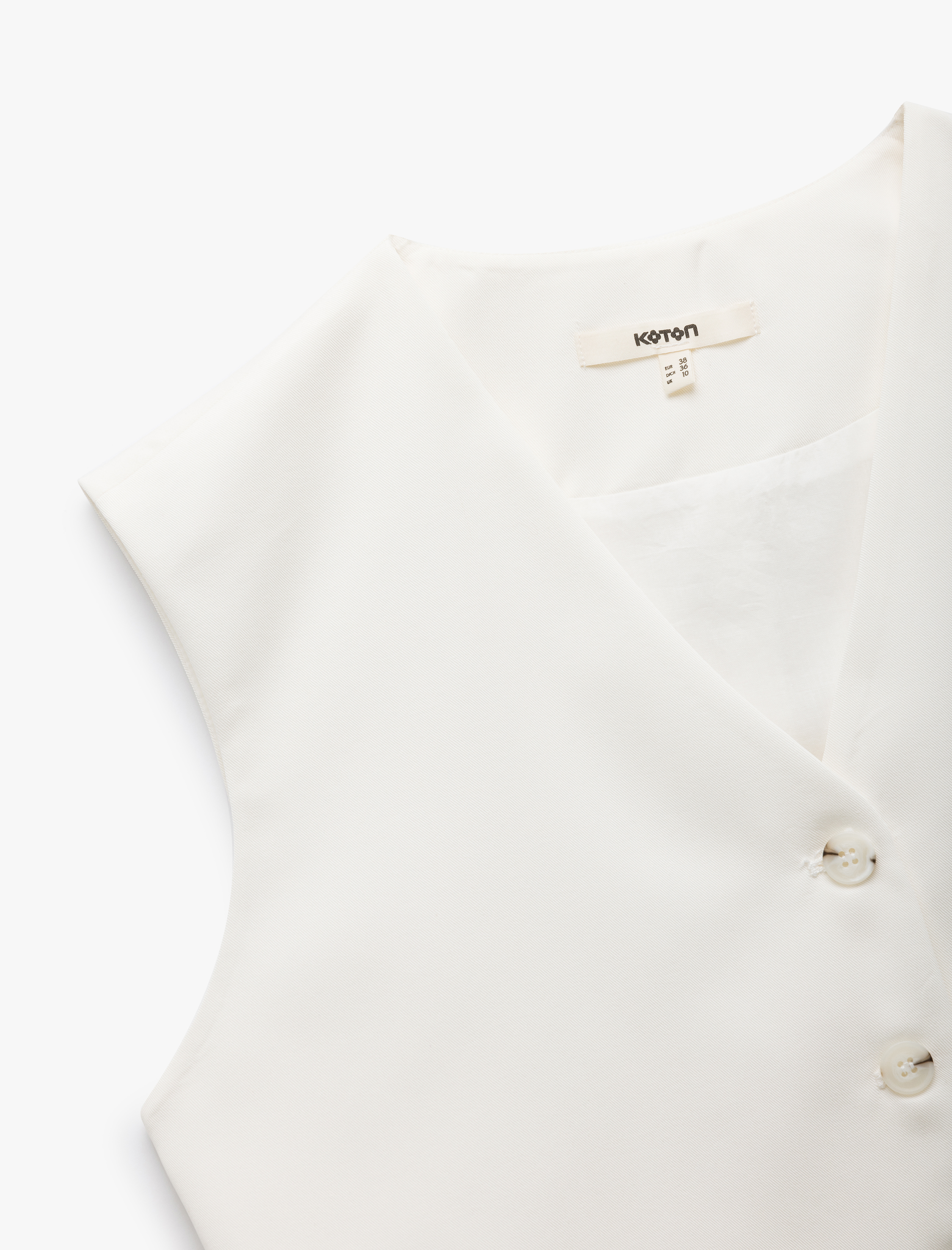   Kolsuz V Yaka Düğmeli Astarlı Modal Kumaş Crop Yelek