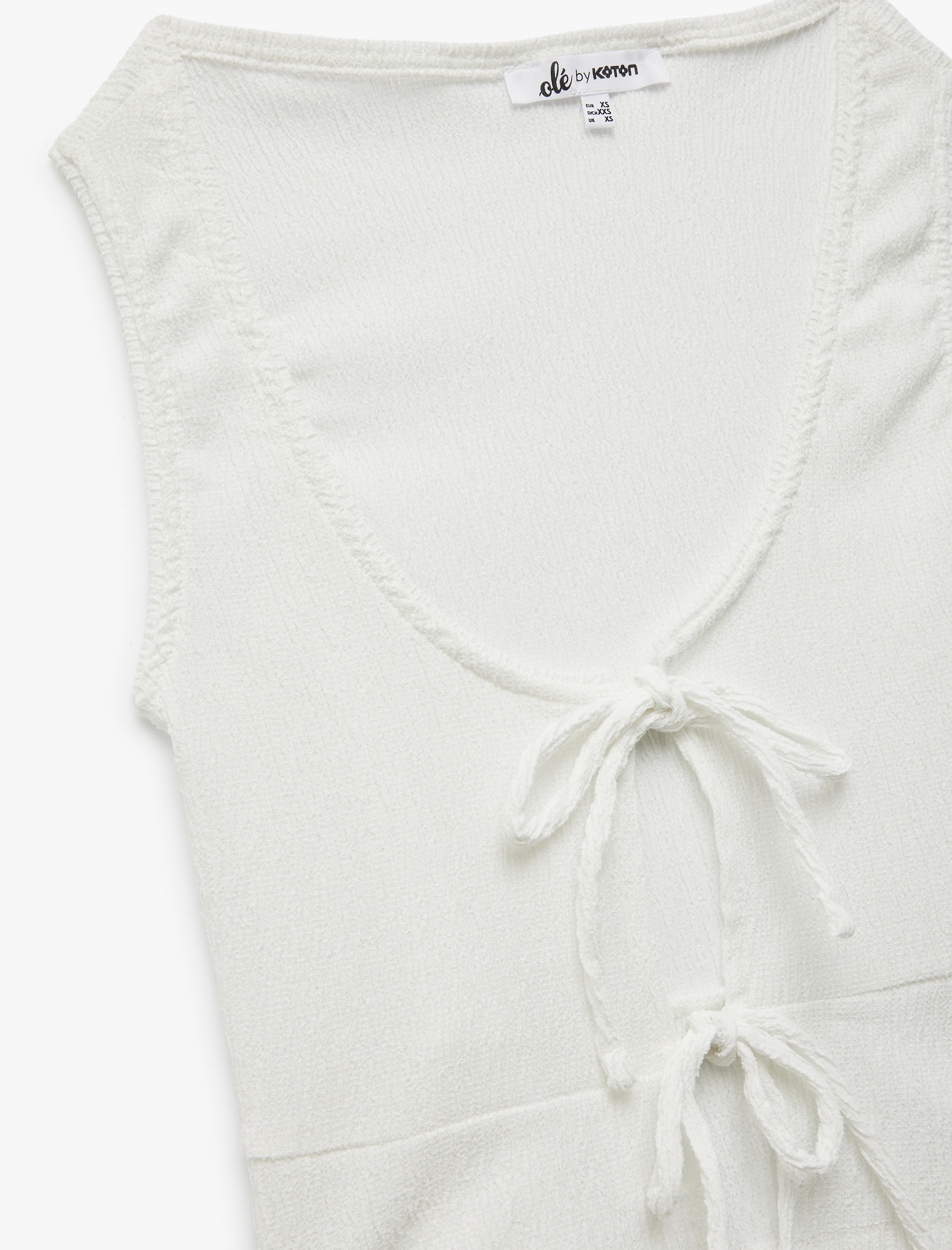   Bağlama Detaylı Bürümcük Kolsuz Bisiklet Yaka Bluz