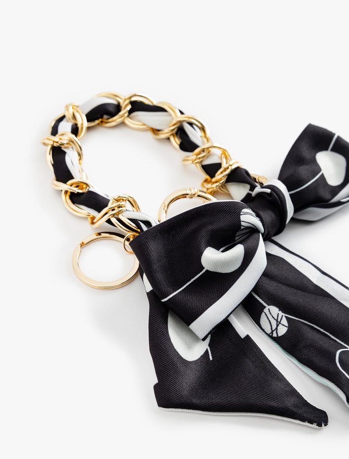 Kadın Metal Aksesuarlı Fiyonklu Desenli Anahtarlık