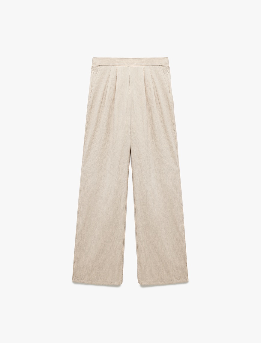   Regular Fit Cepli Pile Detaylı Geniş Paça Kumaş Pantolon