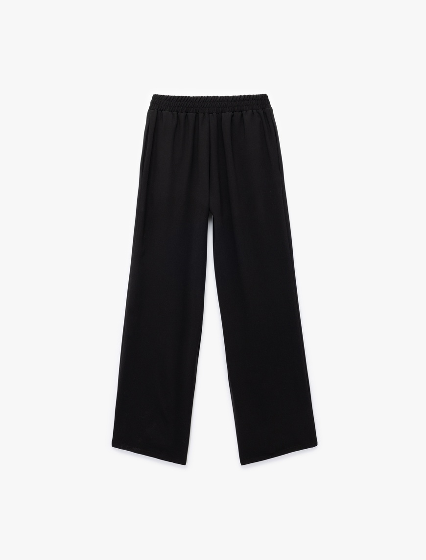   Krep Kumaş Beli Lastikli Düz Bol Paça Pantolon