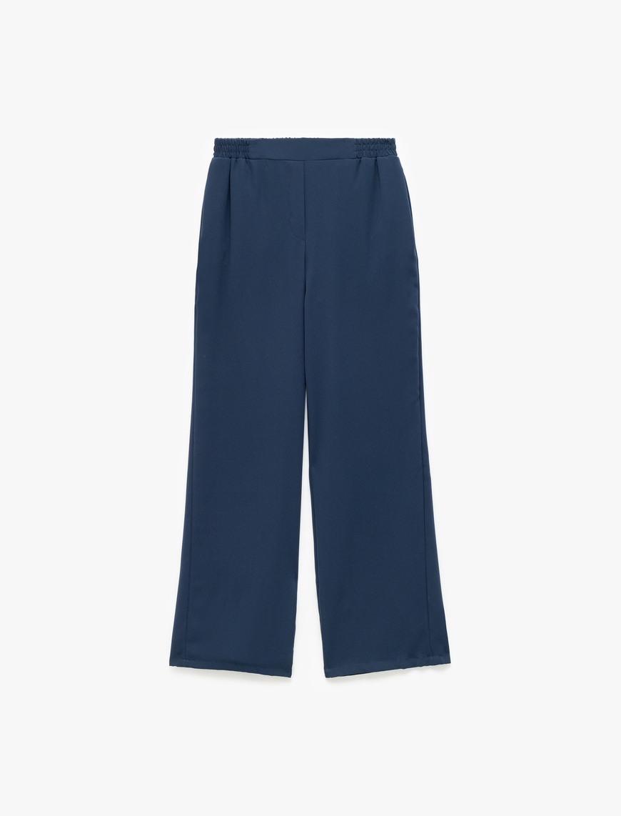   Krep Kumaş Beli Lastikli Düz Bol Paça Pantolon