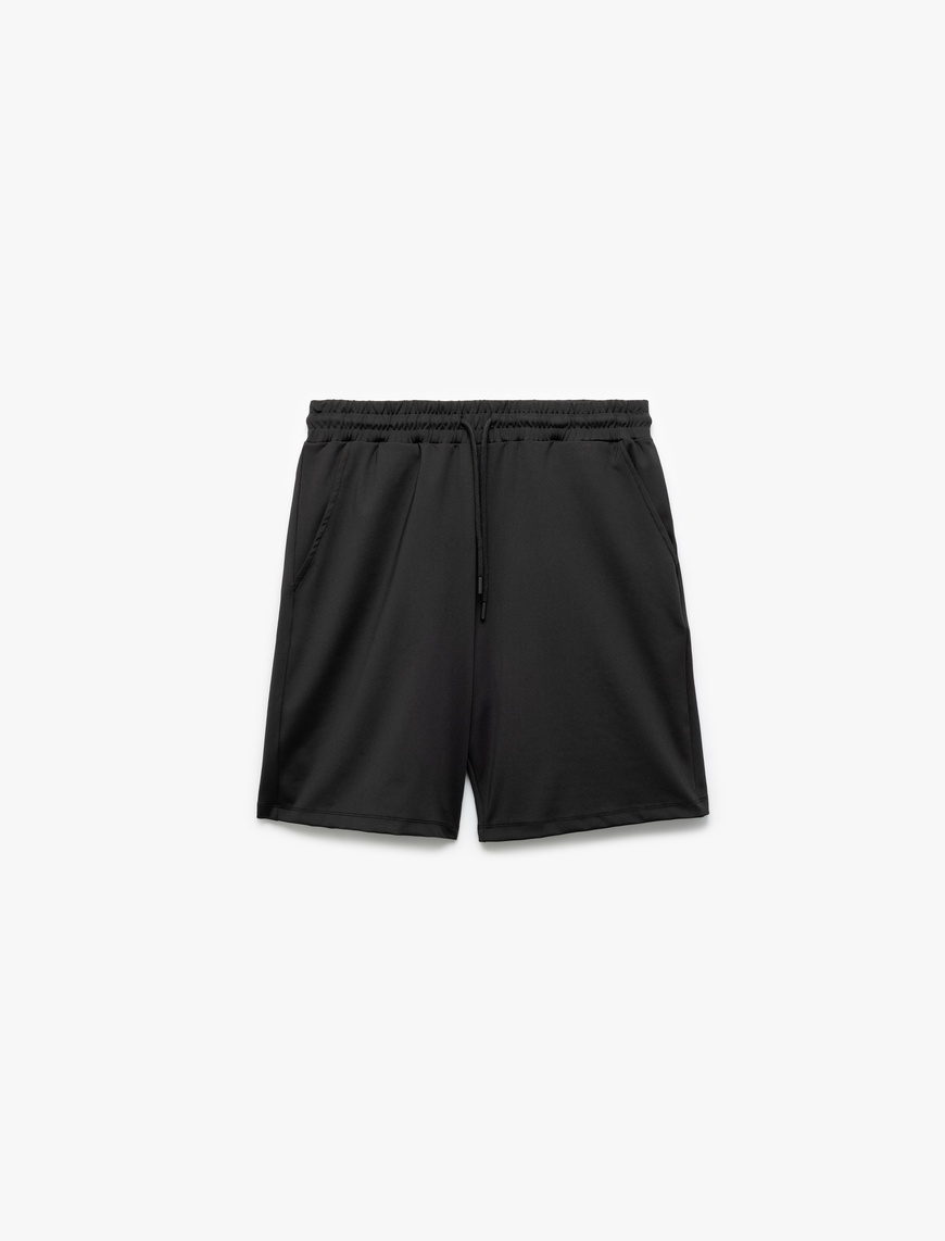   Beli Bağcıklı Cep Detaylı Oversize Bermuda Spor Şort