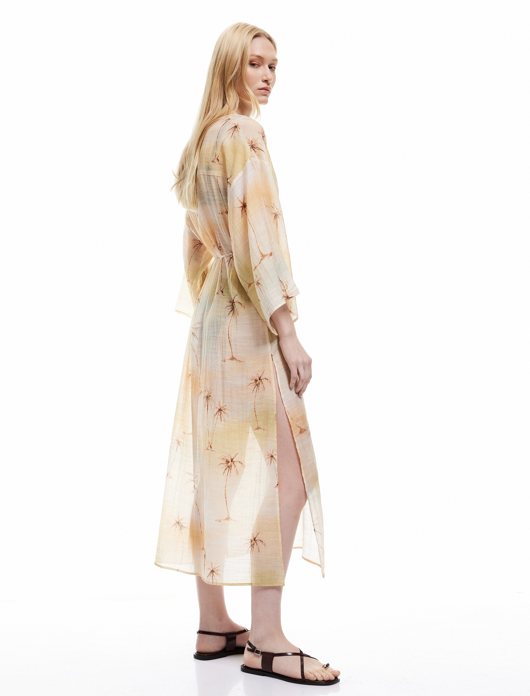   Koton X Şahika Ercümen - Uzun Geniş Kollu Yırtmaçlı V Yaka Transparan Desenli Plaj Elbisesi