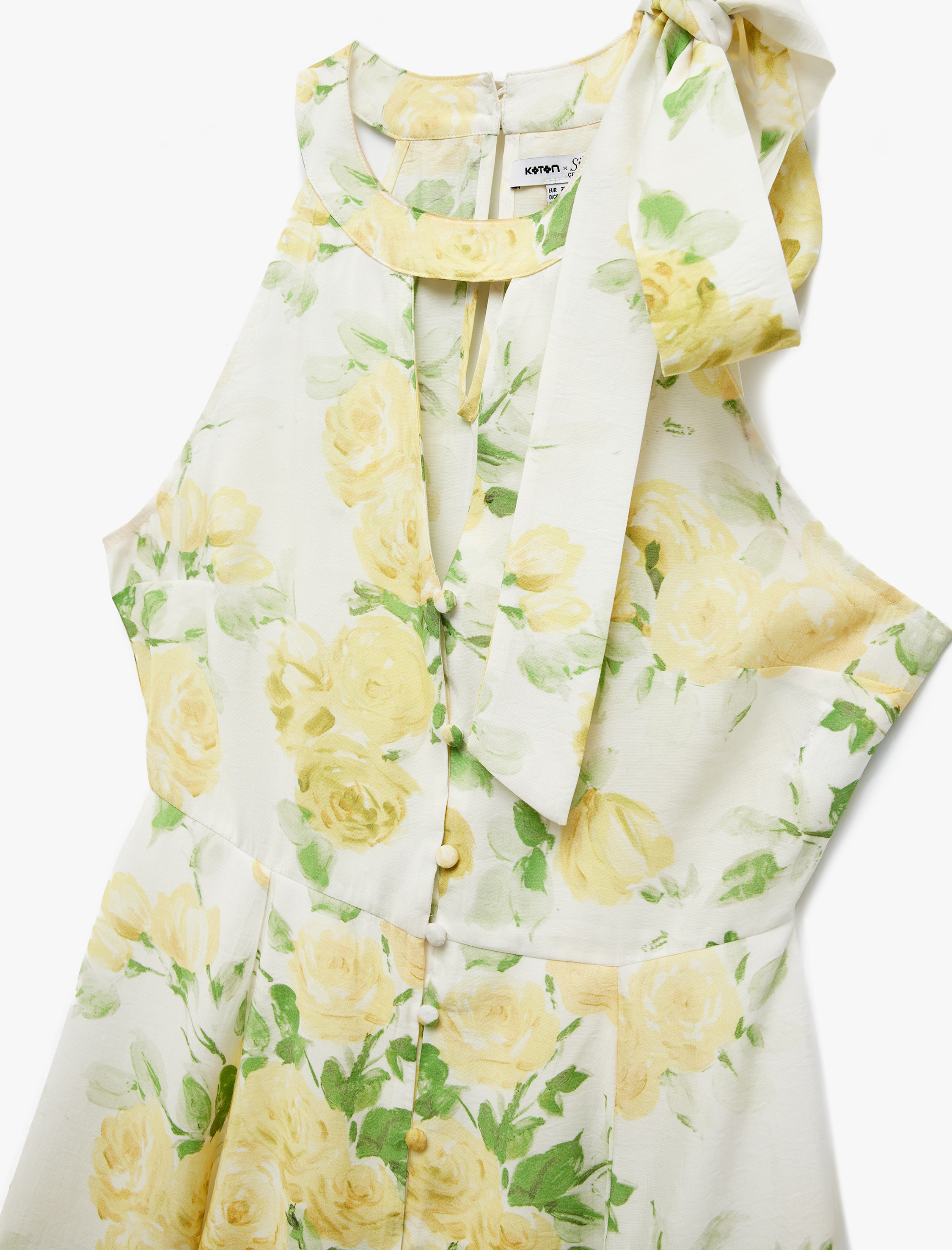   Koton X Sibil Çetinkaya - Astarlı Bağlamalı Yaka Kolsuz A Kesim Mini Çiçekli Elbise