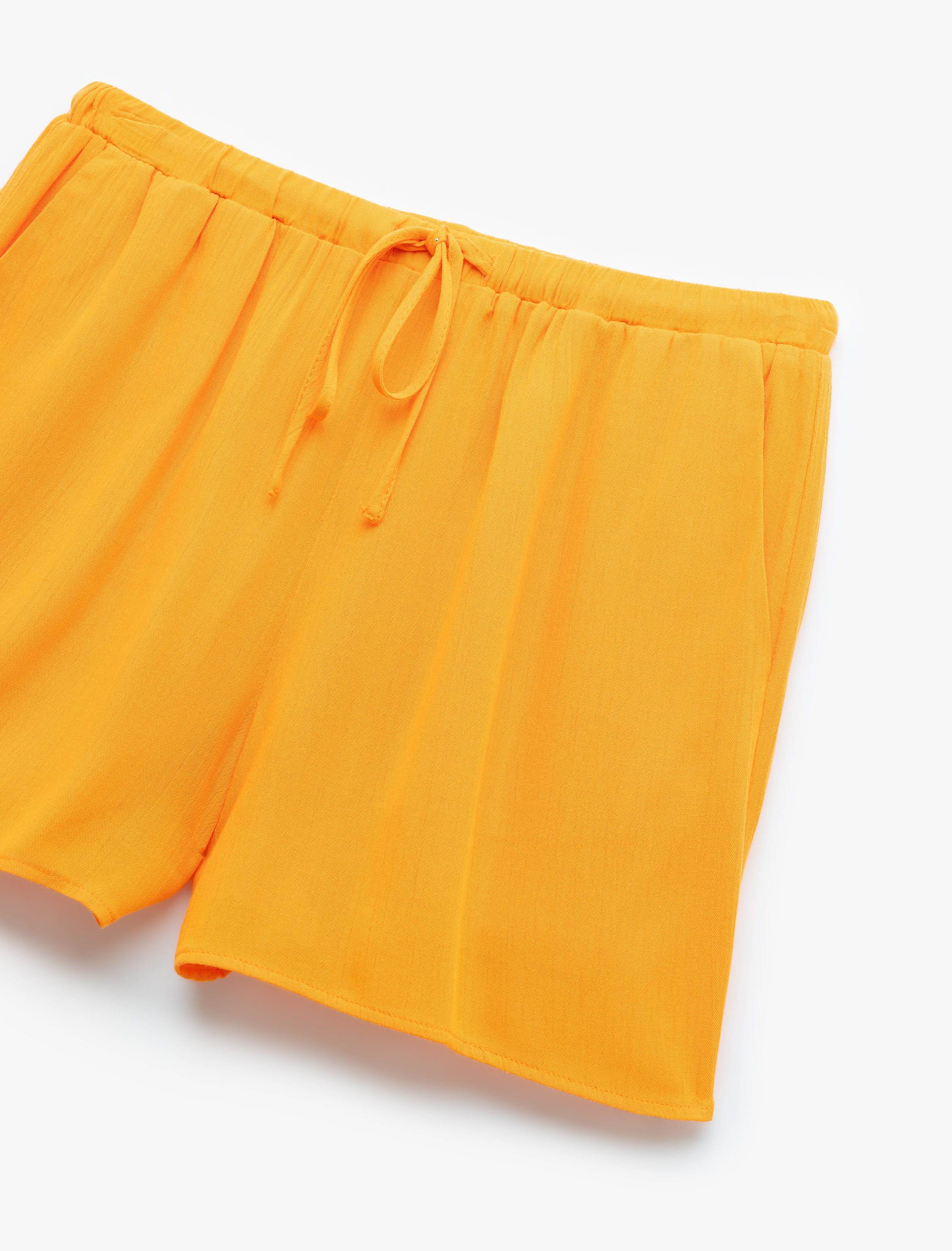   Viskon Crinkle Kumaş Astarlı Beli Lastikli Bağlamalı Cepli Mini Şort