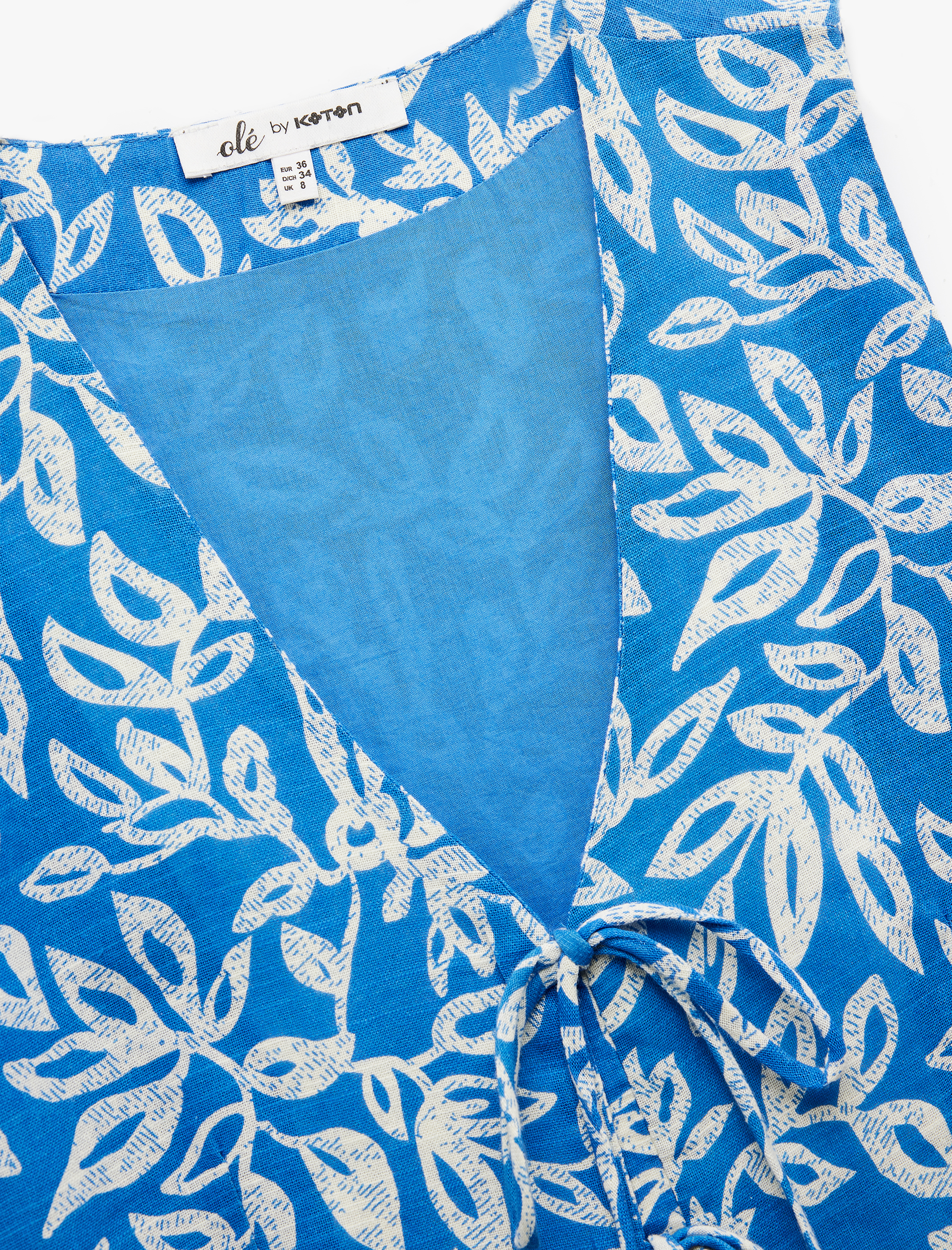   Çiçek Desenli V Yaka Kolsuz Bağlama Detaylı Crop Yelek