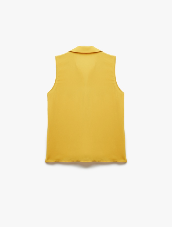  Düğmeli Aplike Detaylı Klasik Yaka Kolsuz Keten Karışımlı Gömlek