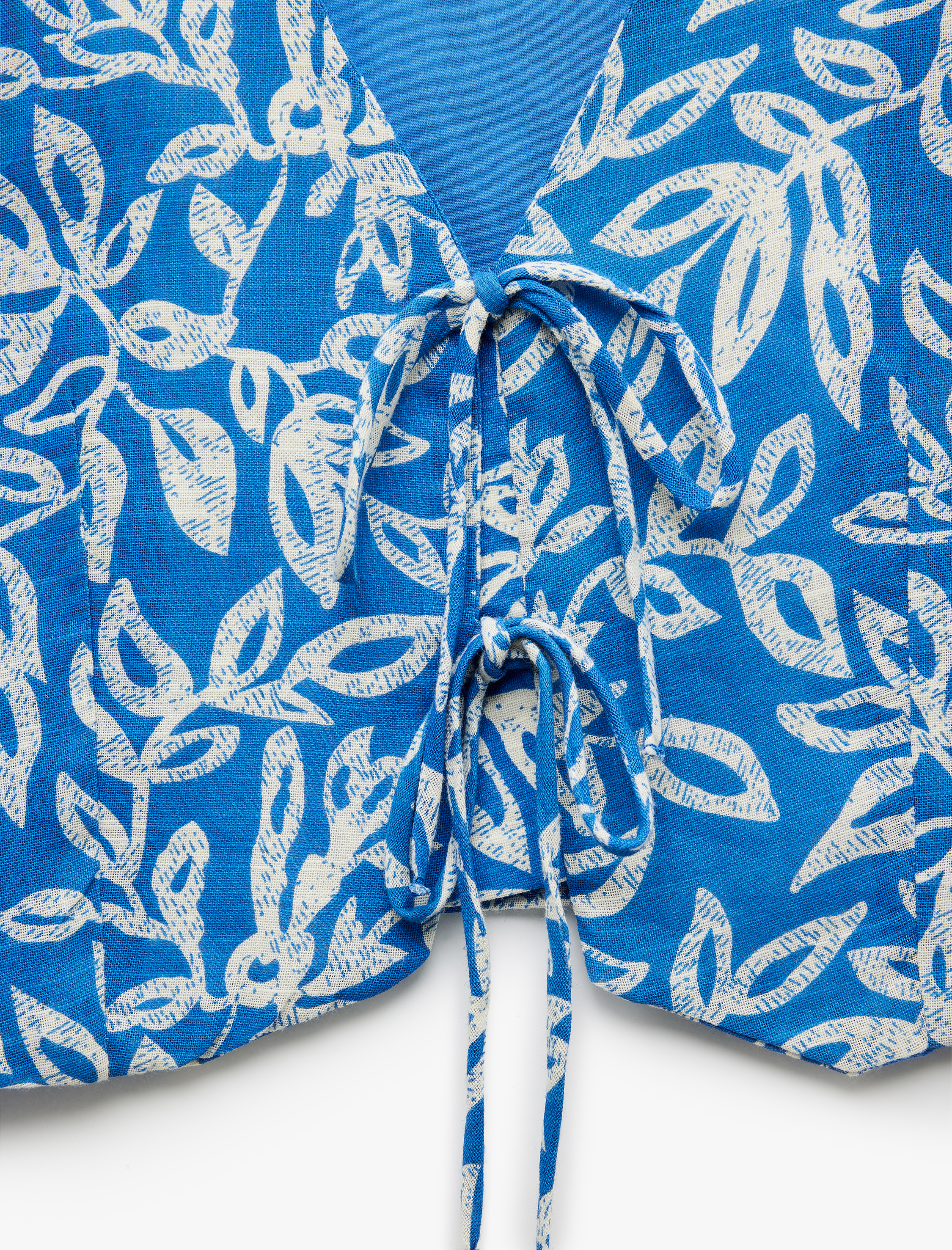   Çiçek Desenli V Yaka Kolsuz Bağlama Detaylı Crop Yelek