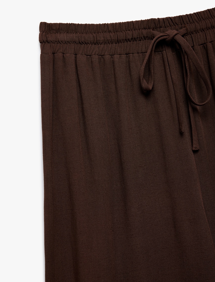   Koton X İnji - Beli Bağcıklı Rahat Kalıplı Keten Karışımlı Geniş Paça Pantolon