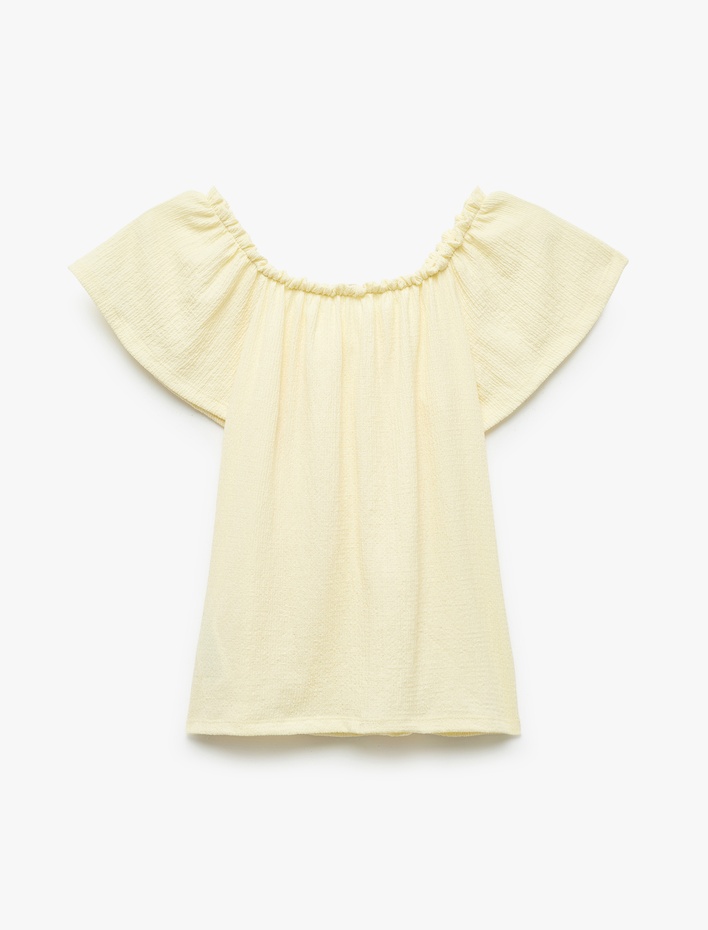 Kız Çocuk Bürümcük Kumaş Fiyonklu Omzu Açık Fırfırlı Kısa Kollu Bluz
