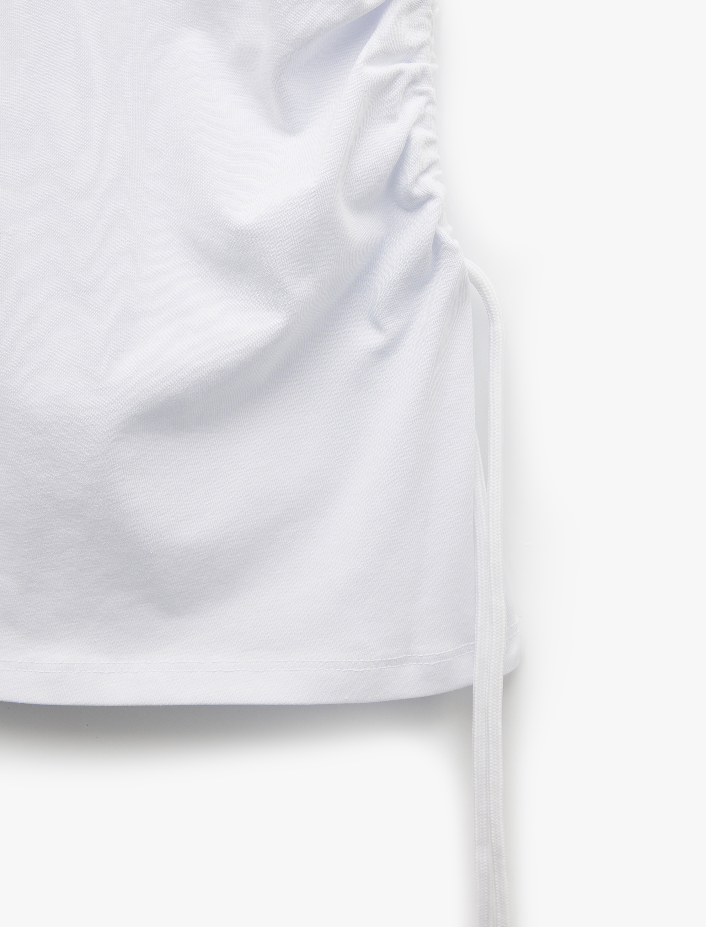   Pamuklu Slim Fit Asimetrik Büzgülü Bağlama Detaylı Kolsuz Bisiklet Yaka Tişört