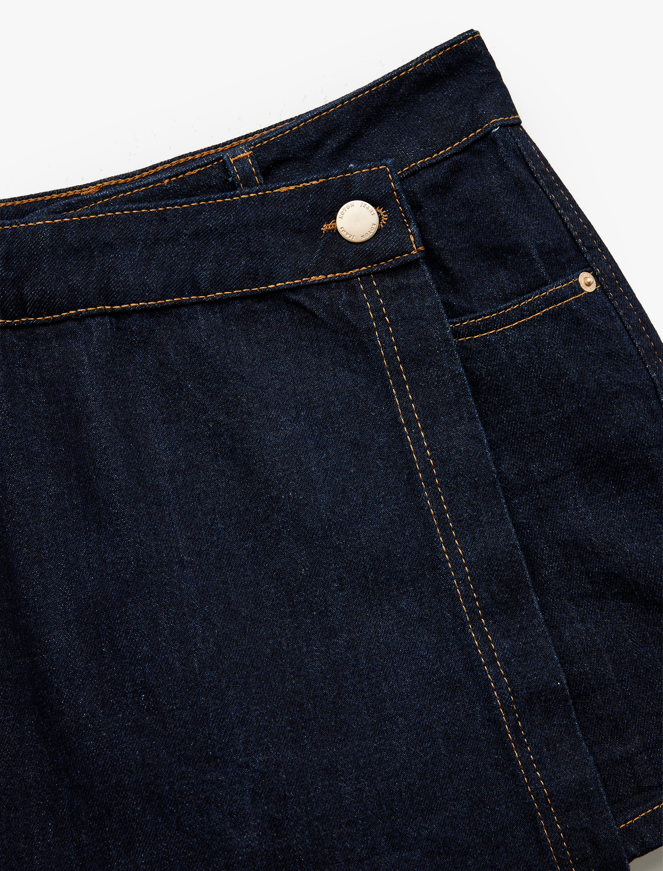   Pamuklu Düğme Detaylı Cepli Asimetrik Denim Mini Şort Etek