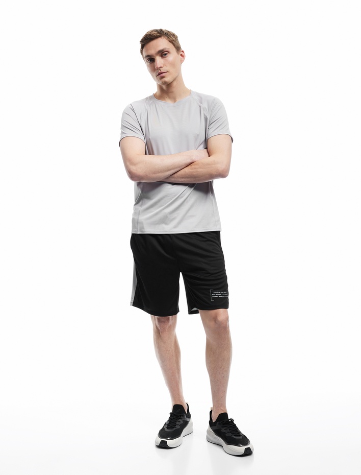  Kısa Kollu Bisiklet Yaka Dikiş Detaylı Oversize Spor Tişört