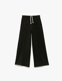 Beli Bağcıklı Bürümcük Kumaş Basic Geniş Paça Pantolon