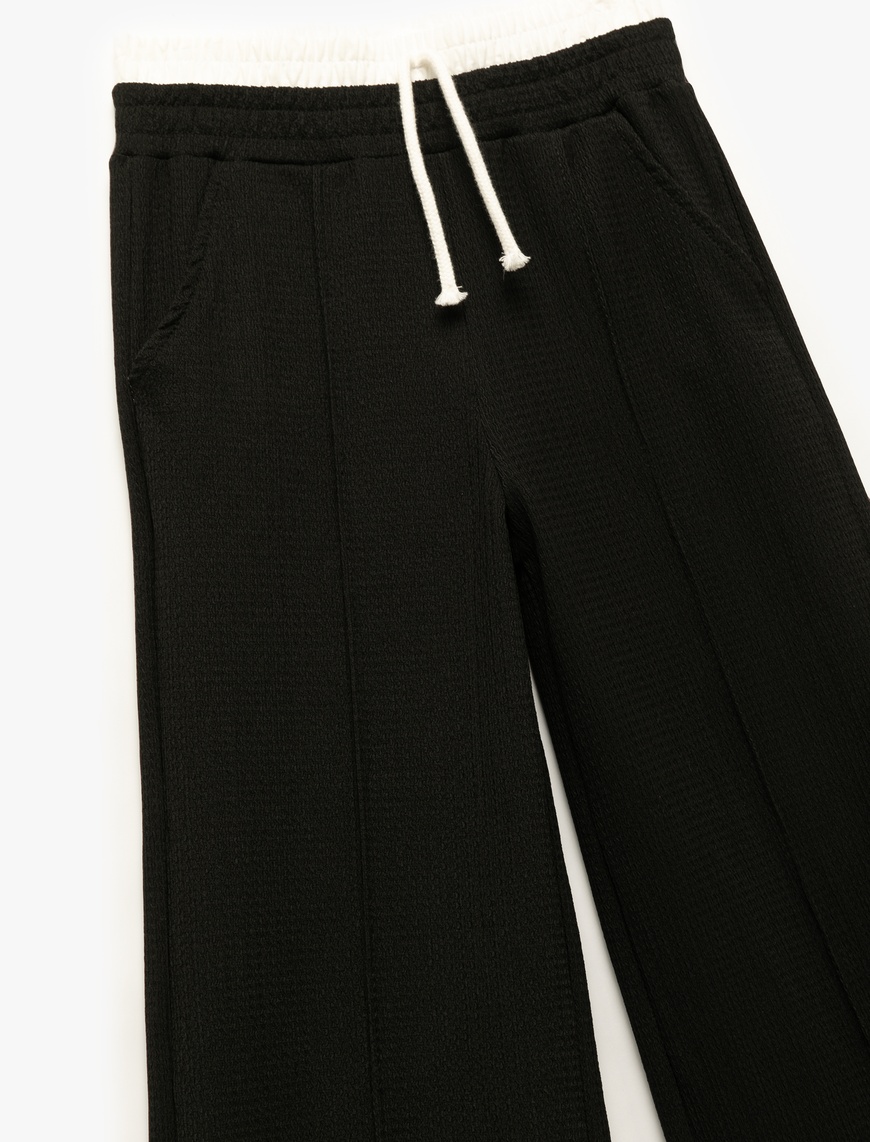  Kız Çocuk Beli Bağcıklı Bürümcük Kumaş Basic Geniş Paça Pantolon