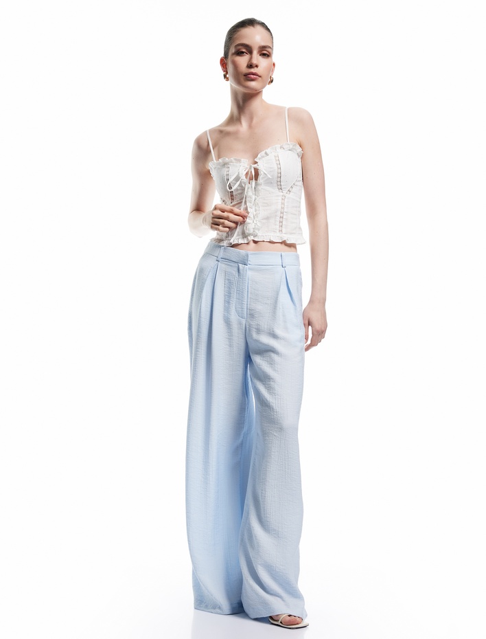  Koton X Sibil Çetinkaya - Viskon Kumaş Cepli Pile Detaylı Palazzo Pantolon