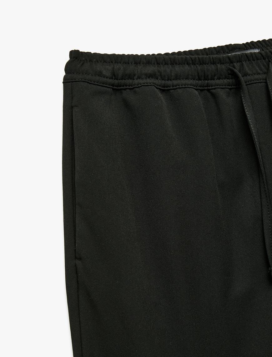   Viskon Karışımlı Cep Detaylı Beli Bağcıklı Pantolon