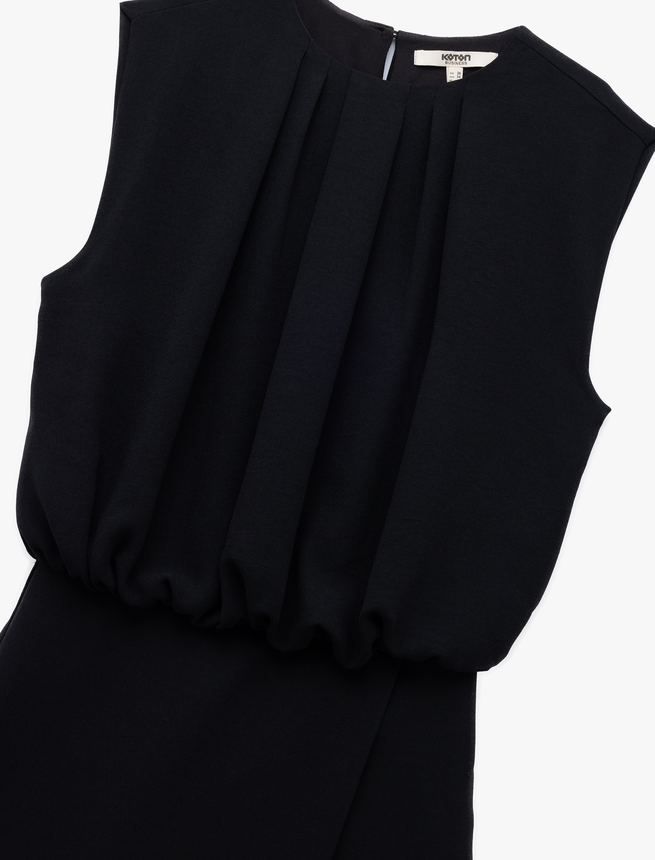   Krep Kumaş Kolsuz Bisiklet Yaka Kruvaze Şort Etek Detaylı Mini Elbise