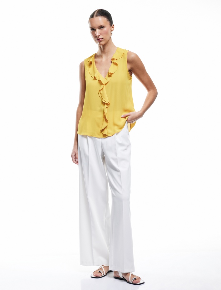  Fırfırlı V Yaka Kolsuz Krep Bluz