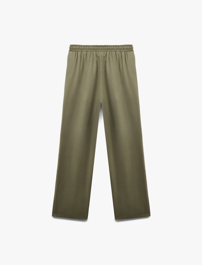  Viskon Cupro Kumaş Beli Bağcıklı Cepli Bol Paça Pantolon