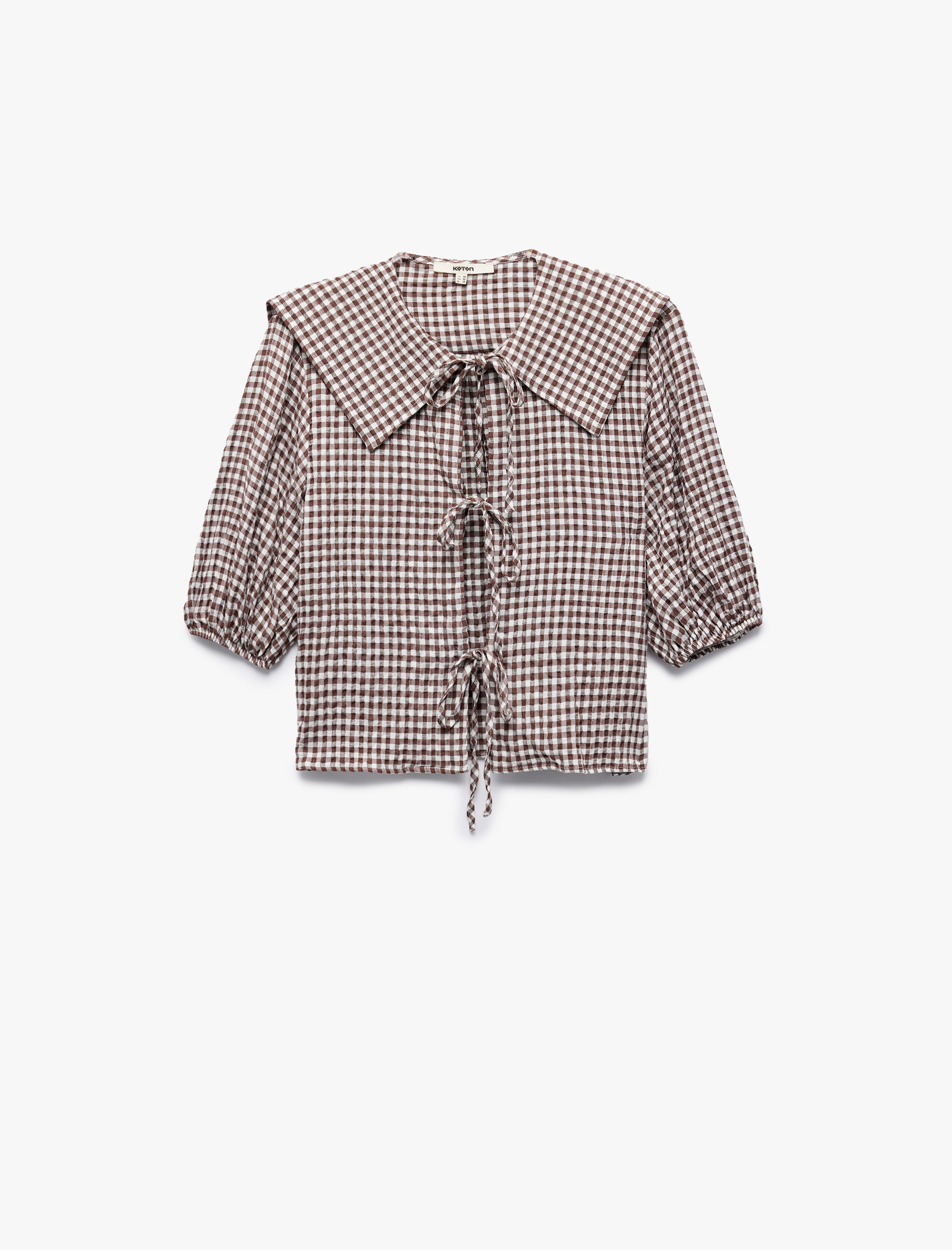   Gömlek Yaka Yarım Balon Kollu Bağcıklı Fiyonk Detaylı Pötikareli Crop Bluz