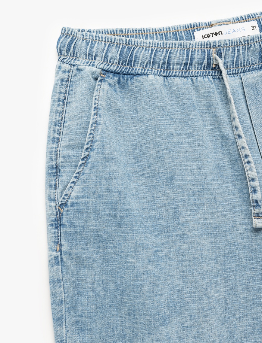   Pamuklu Bol Cep Detaylı Oversize Beli Bağcıklı Bermuda Jean Şort