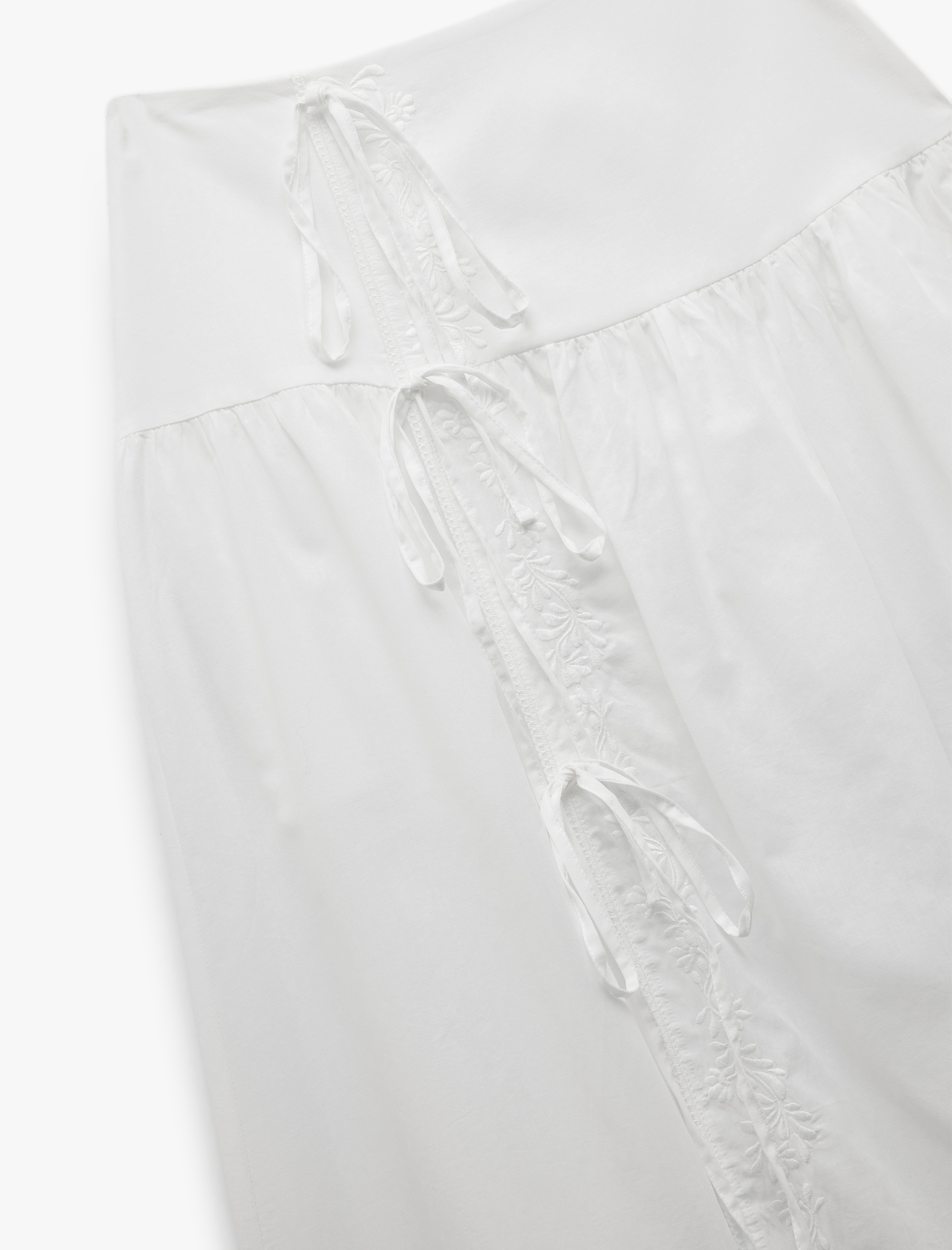   Pamuklu Bağlama Detaylı Fiyonklu Çan Kesim Midi Kloş Etek