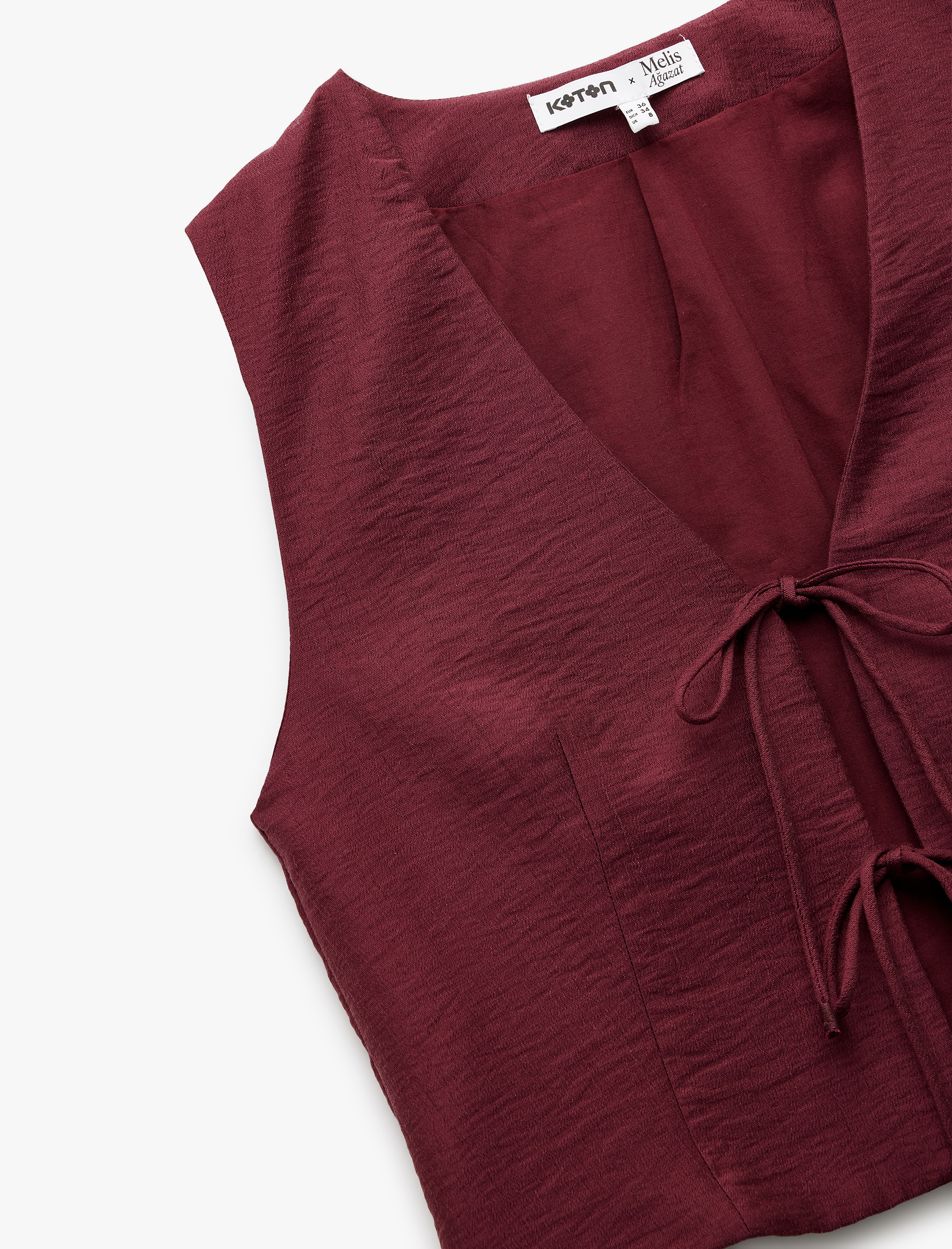   Koton X Melis Ağazat - V Yaka Fiyonklu Önden Bağlama Detaylı Crop Yelek