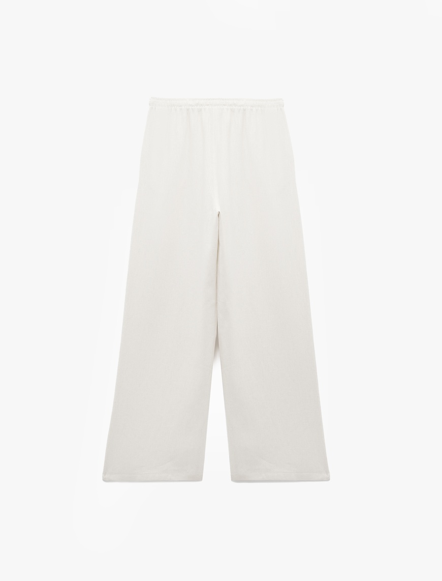   Regular Fit Cepli Pile Detaylı Geniş Paça Kumaş Pantolon