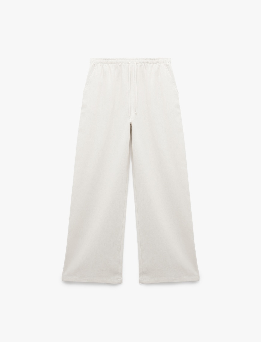   Regular Fit Cepli Pile Detaylı Geniş Paça Kumaş Pantolon