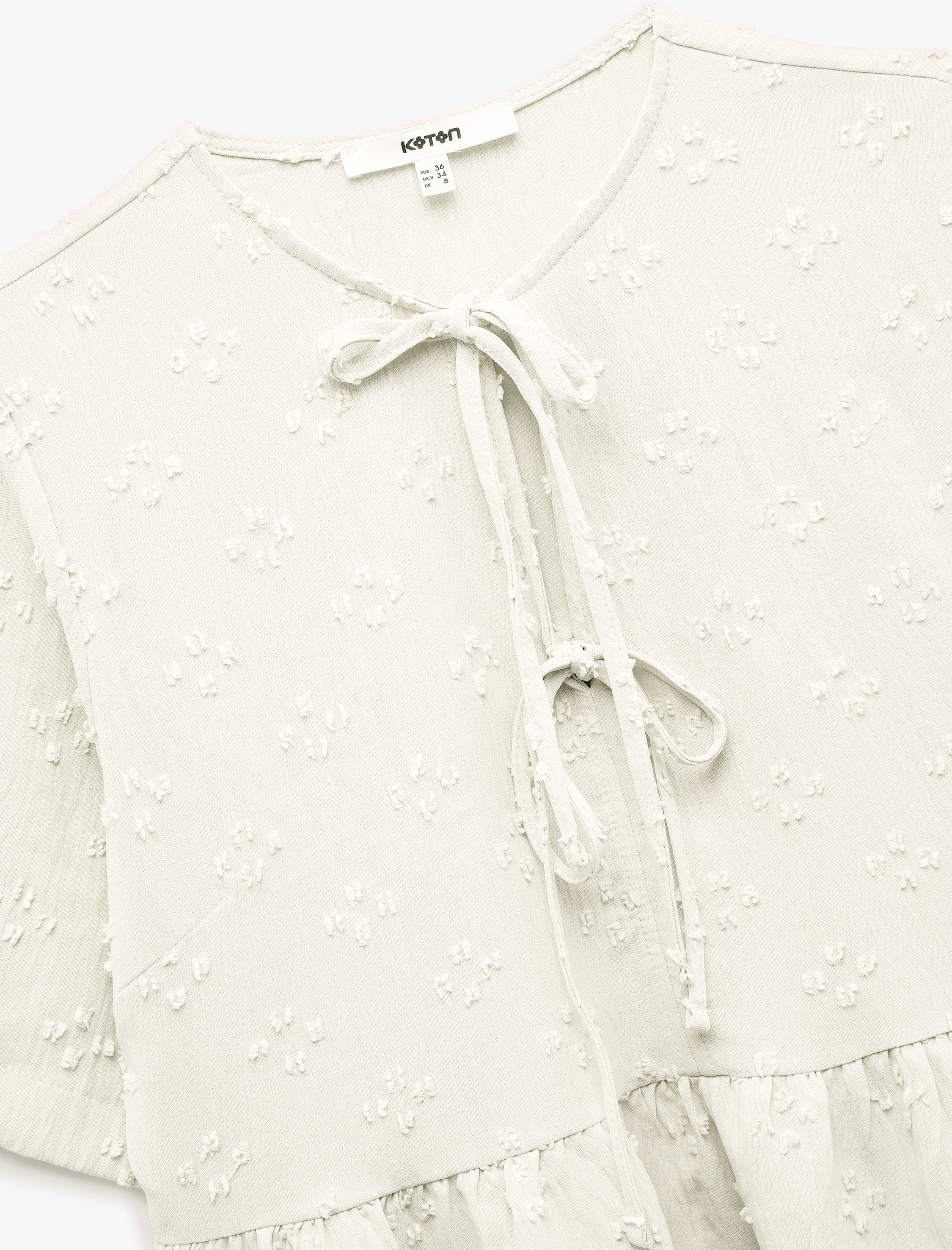   Kısa Kollu Fiyonk Detaylı Dokulu Önden Bağlamalı Bluz