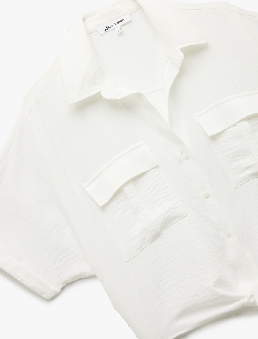   Kısa Kollu Klasik Yaka Bağlama Detaylı Cepli Crop Oversize Bluz