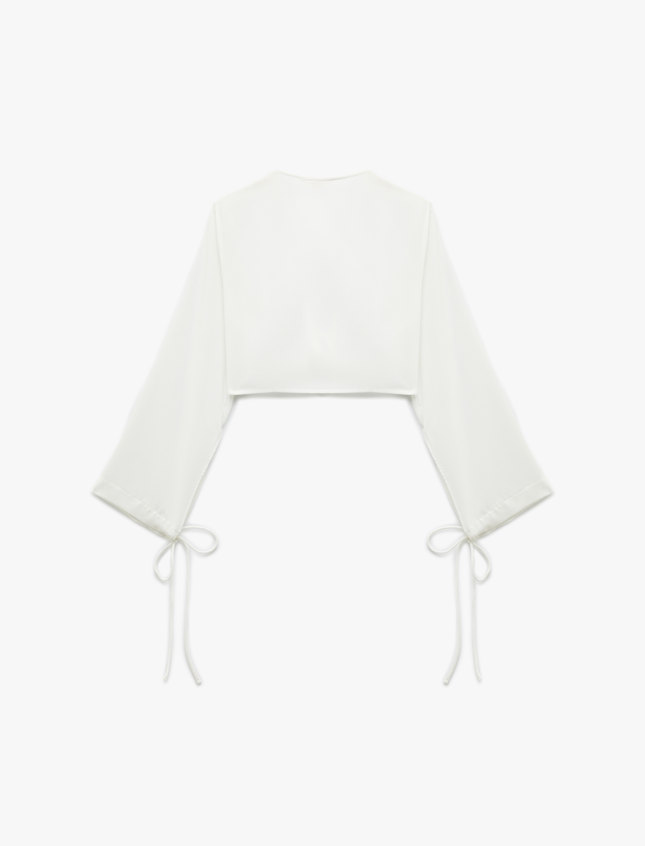   V Yaka Uzun Çan Kol Önden Bağlamalı Fiyonk Detaylı Crop Bluz