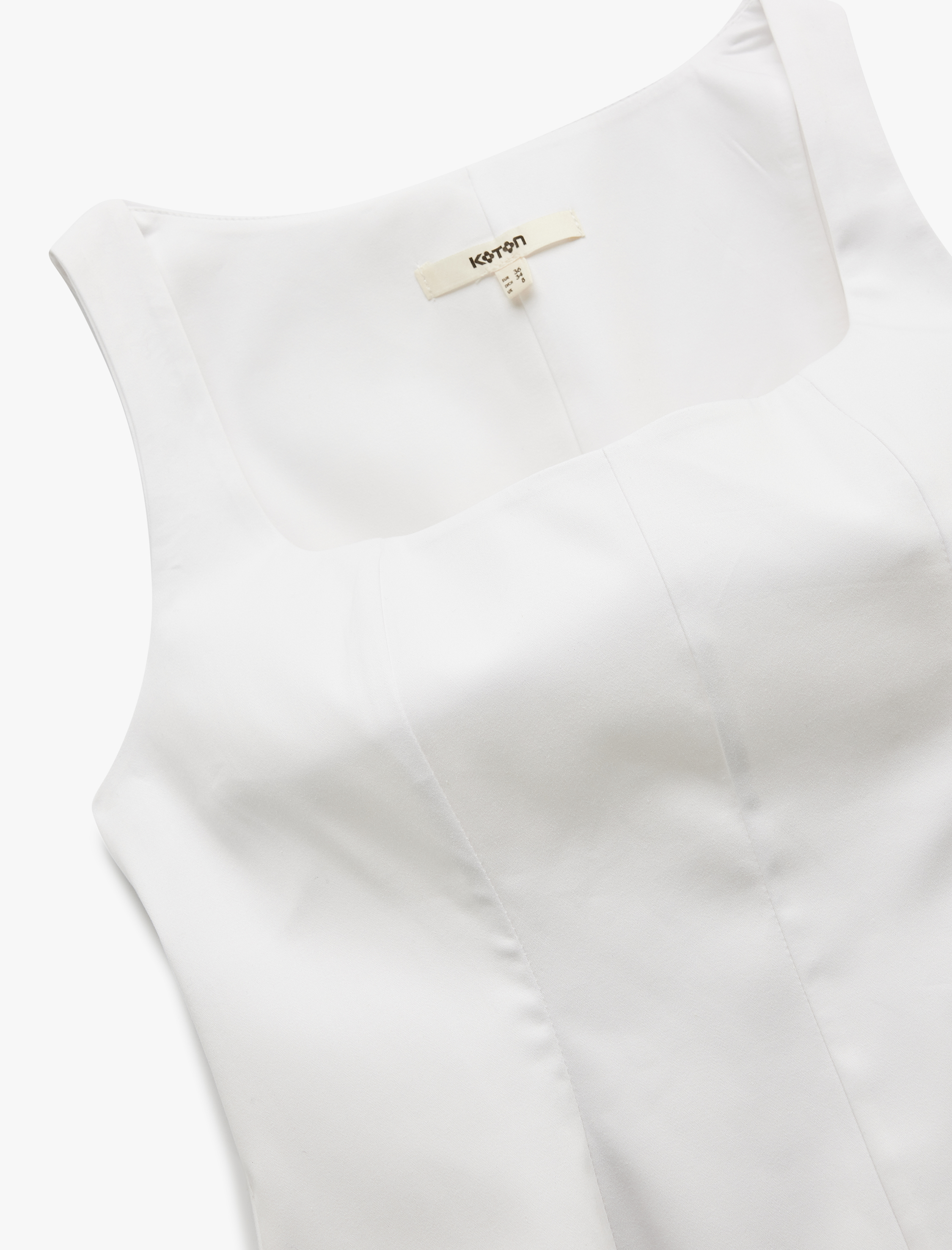 Pamuklu Slim Fit Kolsuz Kare Yaka Peplum Bluz