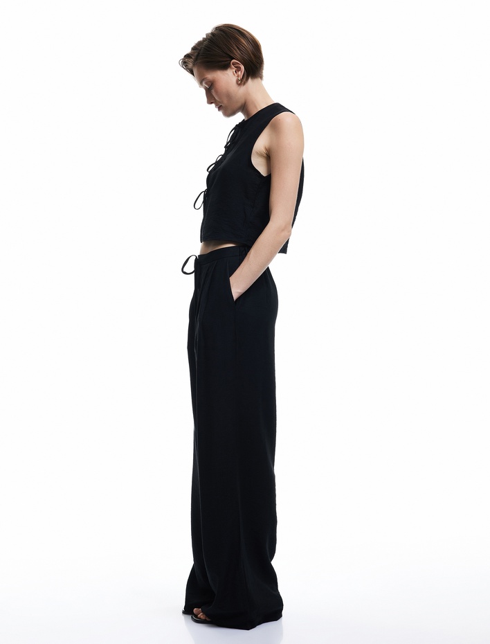  Viskon Kumaş Beli Bağcıklı Pile Detaylı Cepli Geniş Paça Palazzo Pantolon