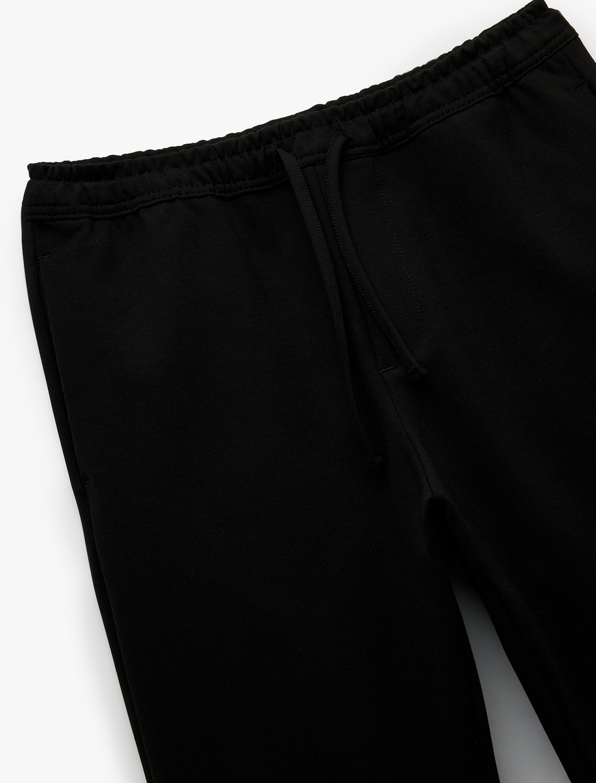   Straight Fit Cep Detaylı Beli Bağcıklı Eşofman Pantolon