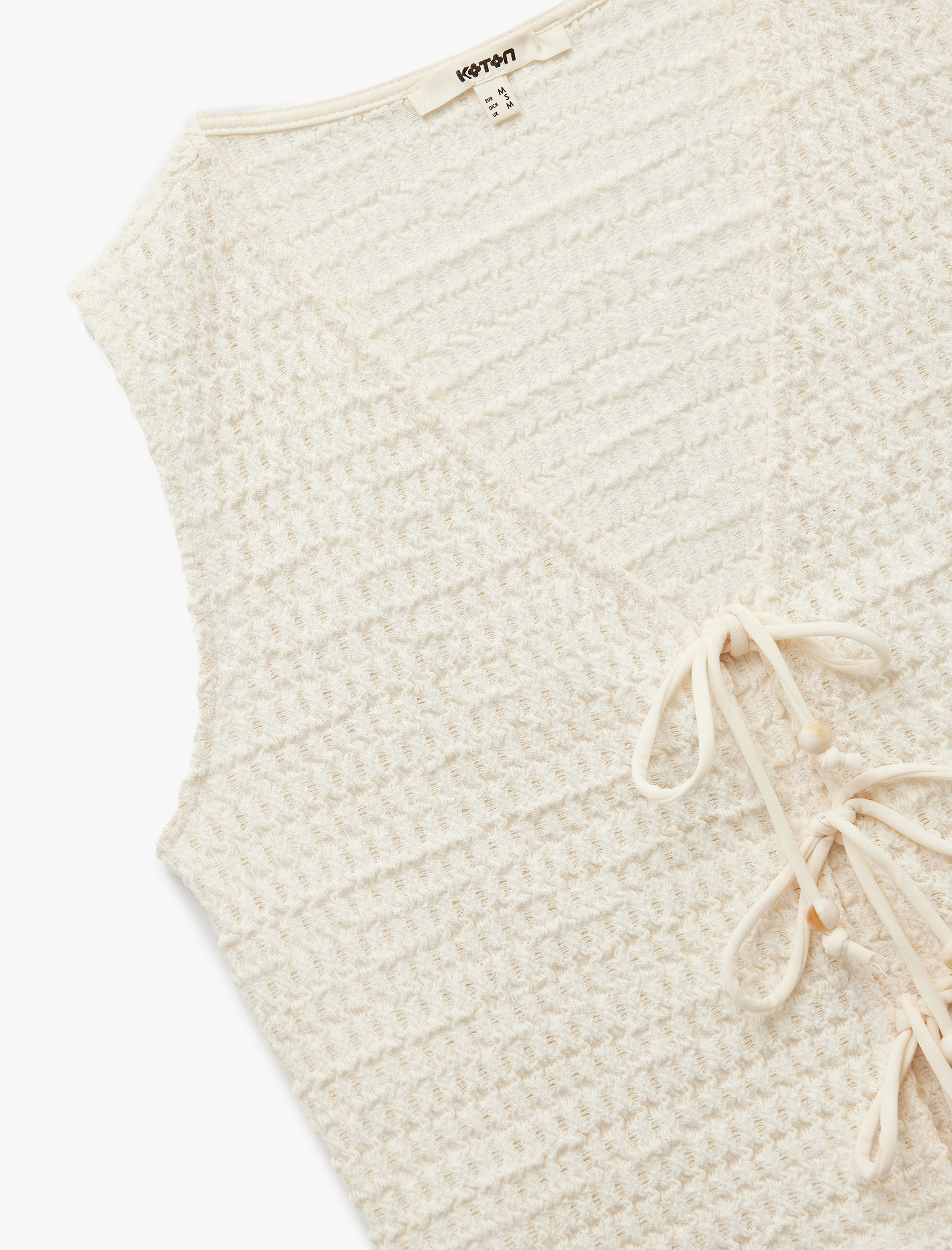   Dokulu Önden Bağlamalı Fiyonk Detaylı V Yaka Kroşe Yelek