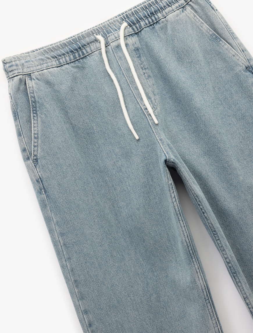   Beli Bağcıklı Cep Detaylı Pamuklu Rahat Kesim Jogger Denim Pantolon