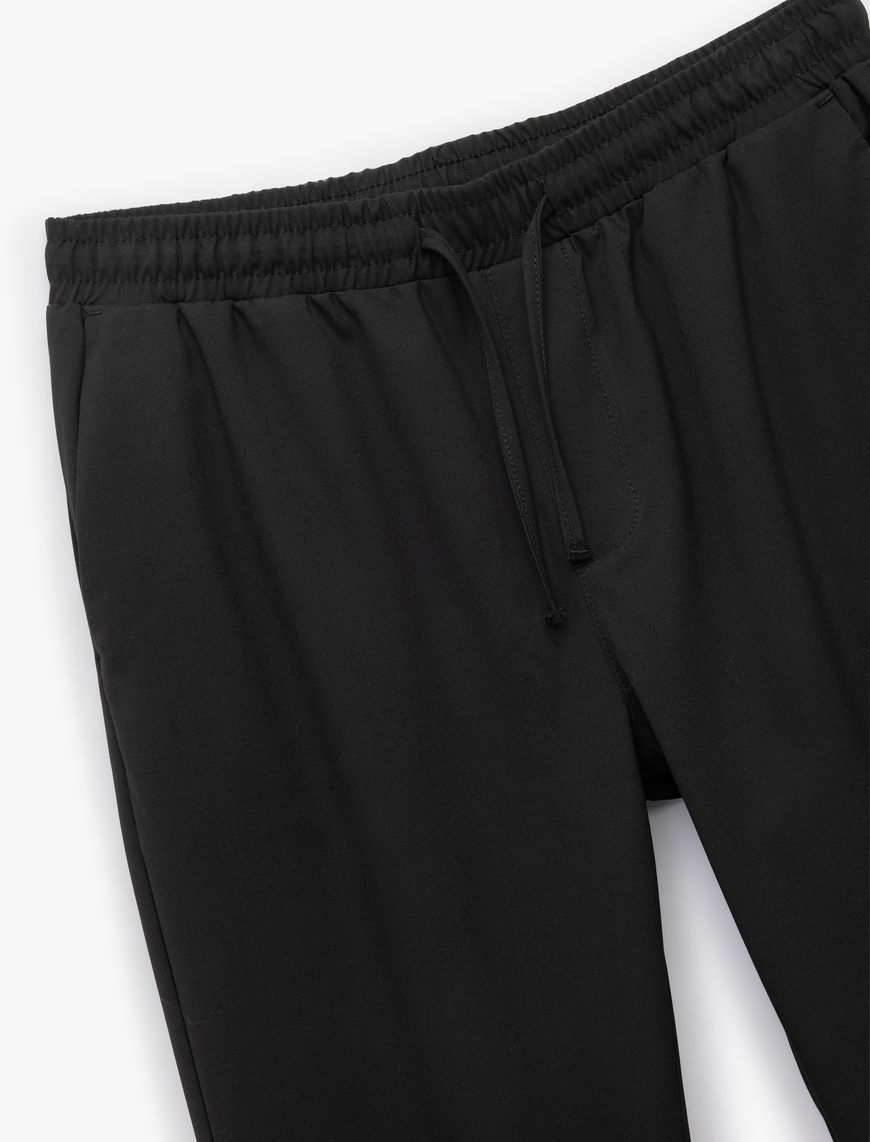   Beli Bağcıklı Katlamalı Paça Cep Detaylı Slim Fit Pantolon