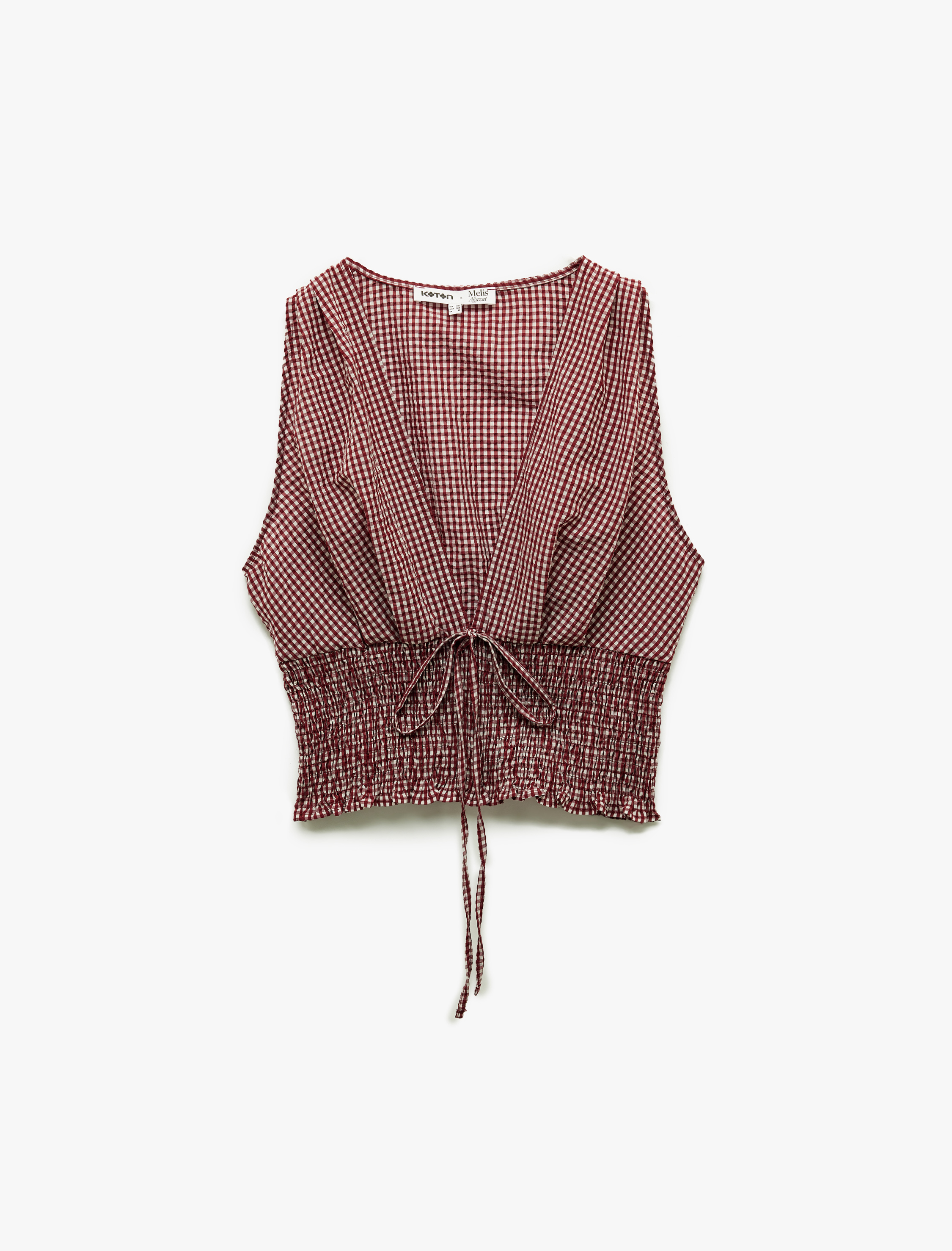   Koton X Melis Ağazat - Kolsuz V Yaka Fiyonklu Gipeli Pötikareli Kısa Bluz