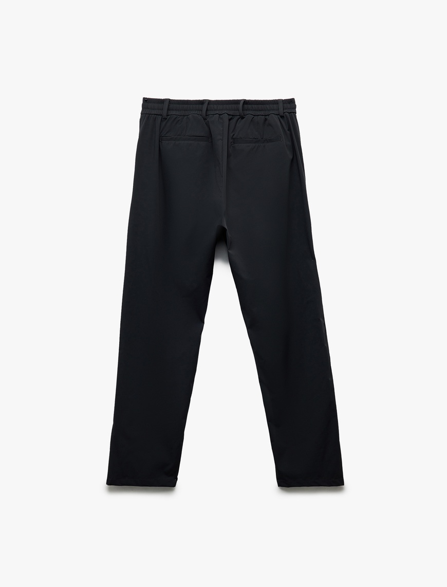   Katlamalı Paça Beli Bağcıklı Düğmeli Esnek Slim Fit Pantolon