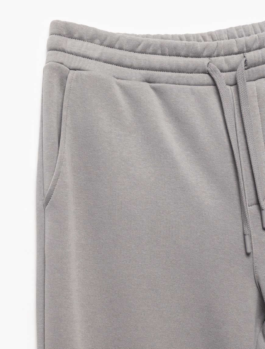   Beli Bağcıklı Şardonlu Cep Detaylı Jogger Eşofman Altı