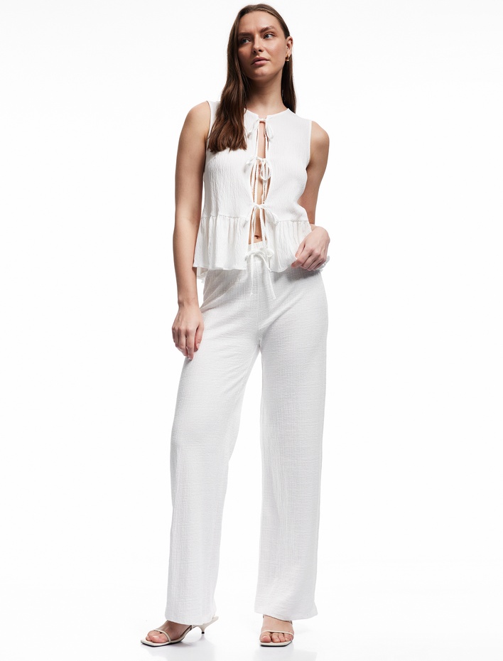  Bisiklet Yaka Fiyonklu Önden Bağlamalı Kolsuz Peplum Bluz