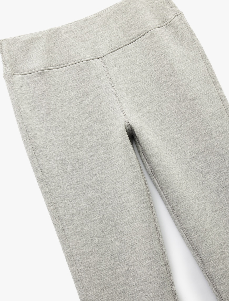   Slim Fit Paçaları Yandan Yırtmaç Detaylı İspanyol Paça Tayt