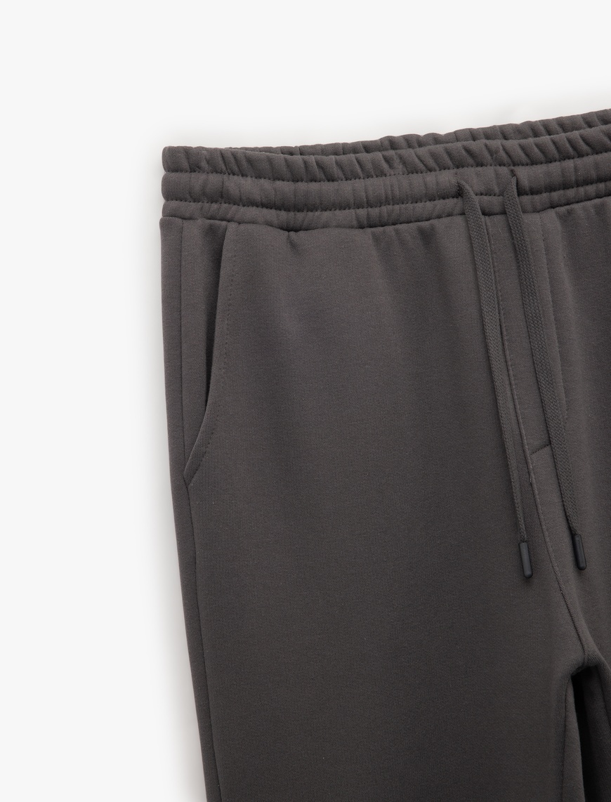   Beli Bağcıklı Şardonlu Cep Detaylı Jogger Eşofman Altı